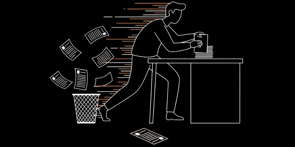 recruiter haphazardly sorting resumes